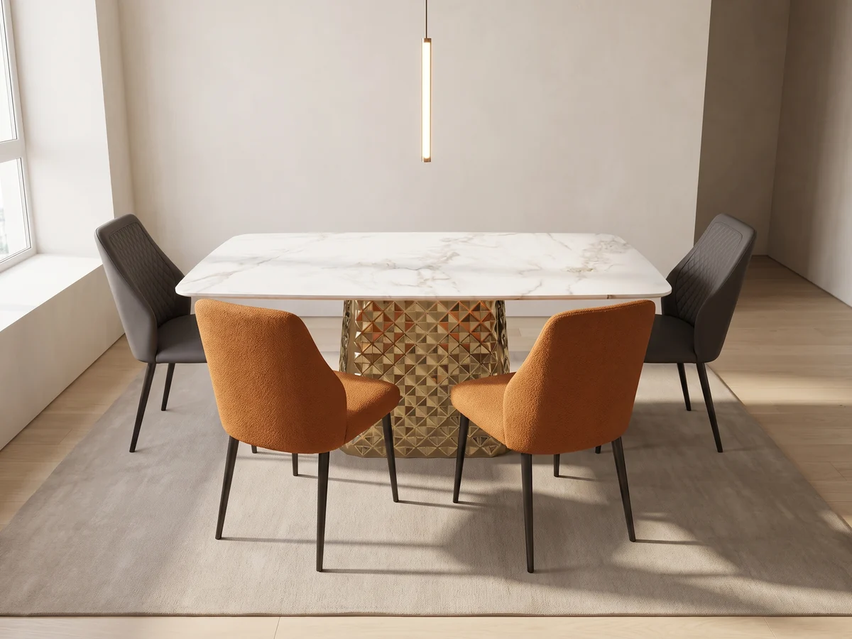 White marble-top dining table with two tan and two charcoal upholstered chairs